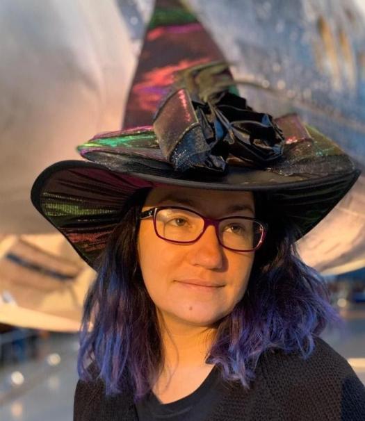 Dr. Ivona Cetinic wearing a hat and glasses.